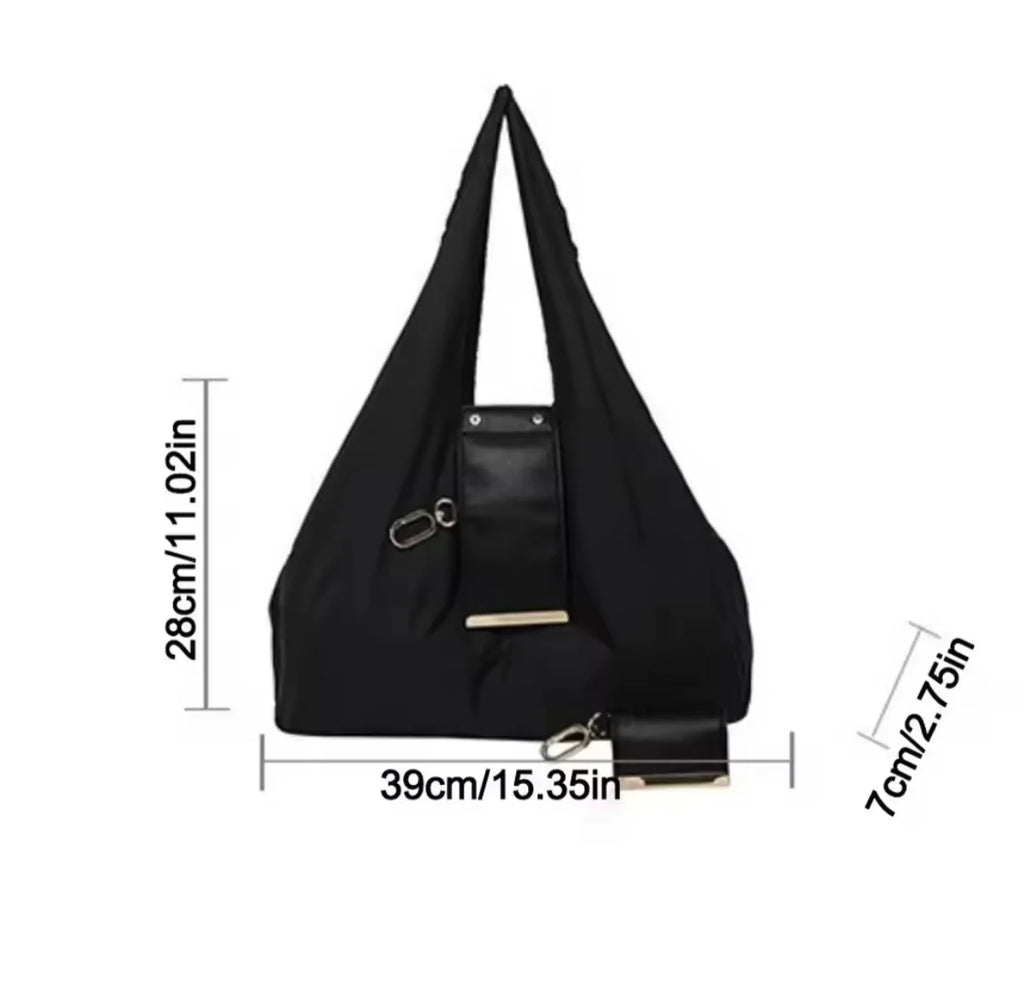 Black handbag with measurements on a white background